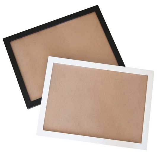 Empty black and white wooden frames for displaying completed custom photo puzzles from Date in a Crate.